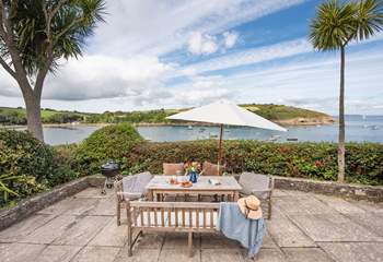 Enjoy a spot of al fresco dining while gazing out to sea.