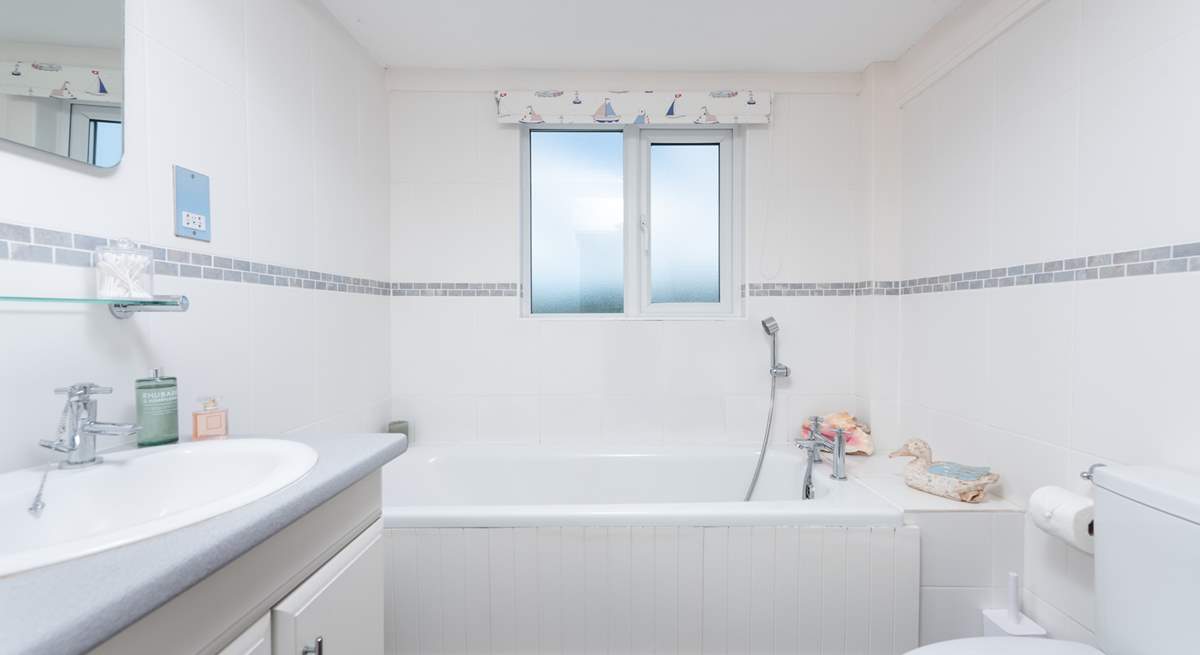 A fantastic family bathroom is located next to bedroom 1.