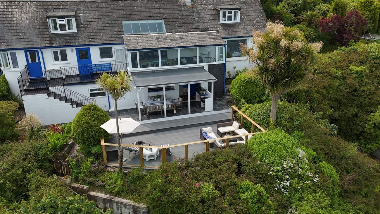 Outside, the lower deck and canopy is perfect for dining on a summer's evening.