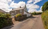 Pheasant Cottage is located just off the road, leading into Stithians. The parking space is located at the rear of the cottage.  - Thumbnail Image