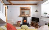 Sink into the sofa and light the wood-burner. - Thumbnail Image