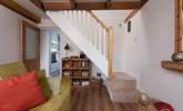 Cottage stairs lead upstairs to the bedroom.  - Thumbnail Image