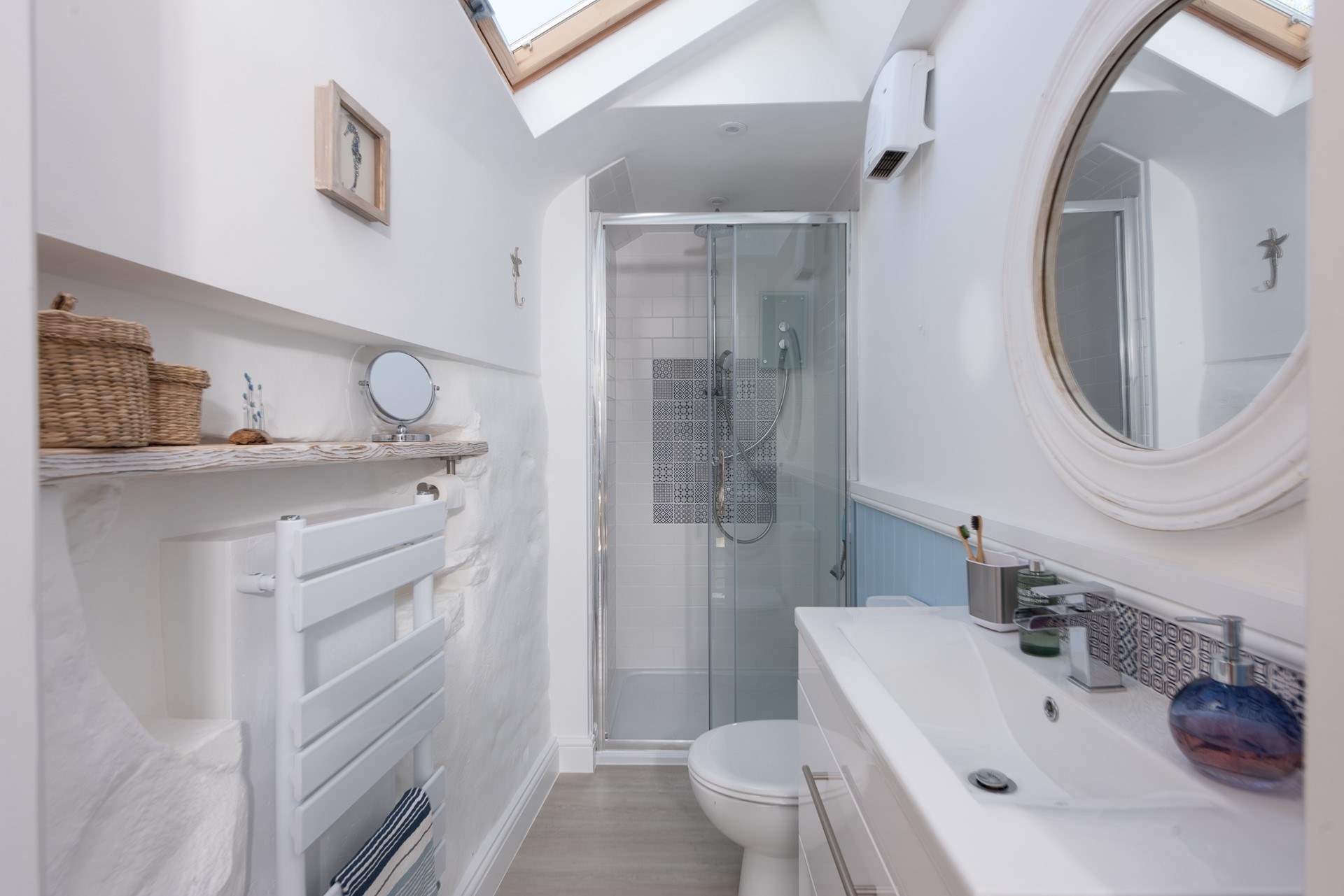 There is one small step up into the shower-room. 