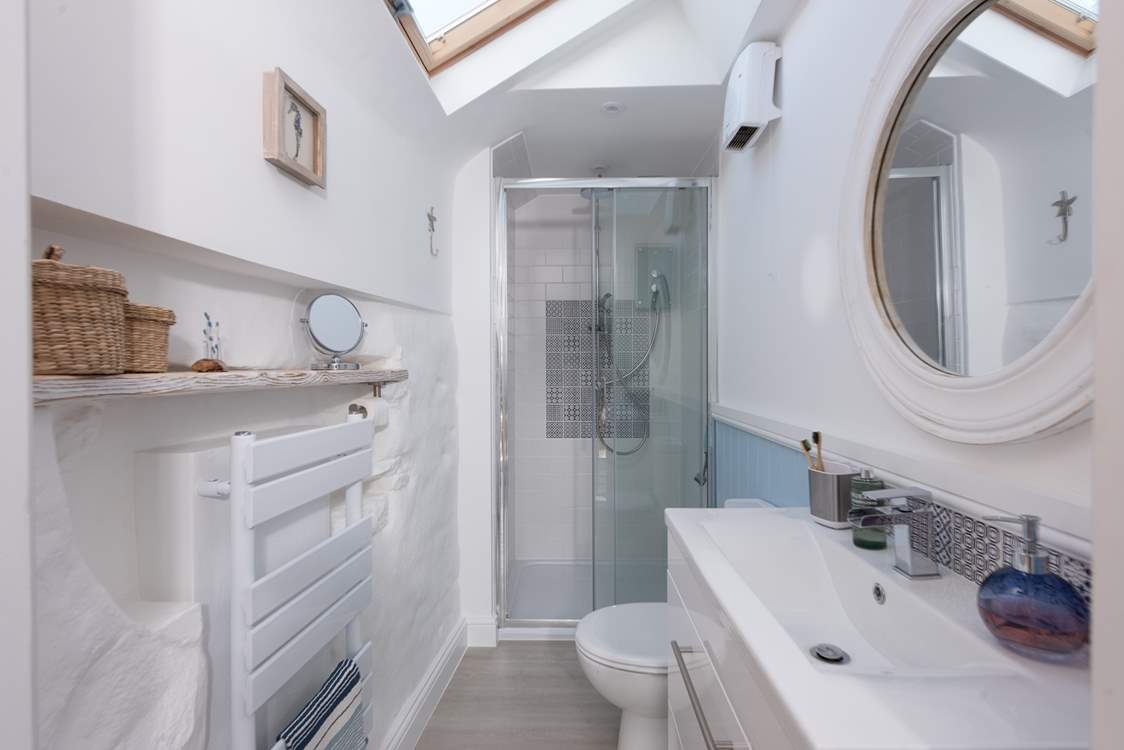 There is one small step up into the shower-room.