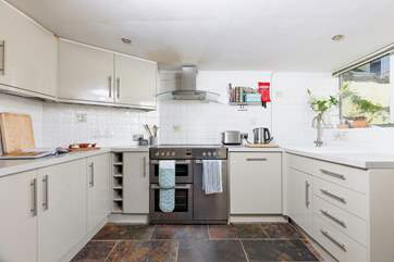 The kitchen has the all-important dishwasher so no squabbling over the washing up here!