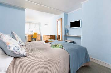 Pretty linens and comfy beds ensure a great night's sleep.