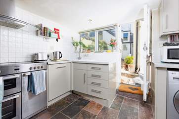 The separate kitchen has all the equipment you'll need. Please note, the courtyard is shared with several neighbouring properties.