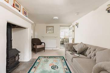 Just off the kitchen/breakfast-room is this cosy snug; perfect for hiding away in.