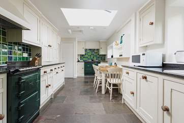 You'll enjoy cooking up holiday meals in this sociable space. Please note the Aga at the far end is decorative only and not for use.