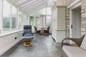 The conservatory is an additional bonus space where you can escape with a good book.