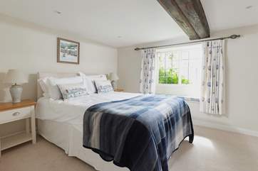 Neutral tones and soft linen ensure you can totally relax.