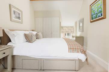 Another view of this pretty bedroom.