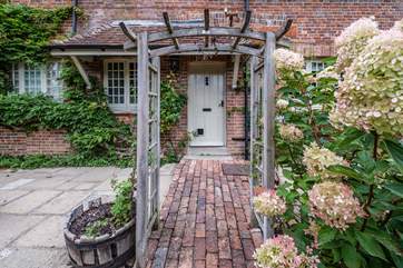 The gardens are beautifully tendered at Castlemans Coach House.