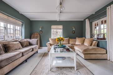 The snug is perfect for relaxing on the comfy sofas in front of the Smart TV.