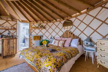 The king-sized bed is idyllic for a restful night's sleep.