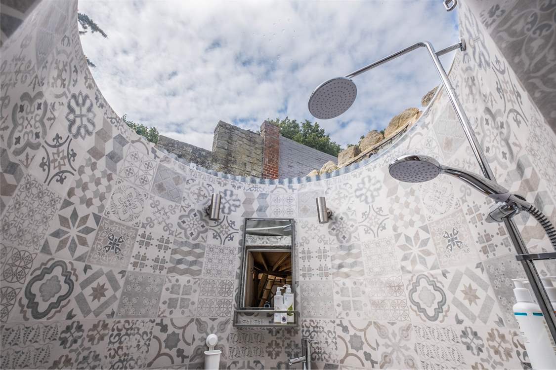 And take a look at the roof! The dome ceiling makes it feel as if you are showering in the wilds.