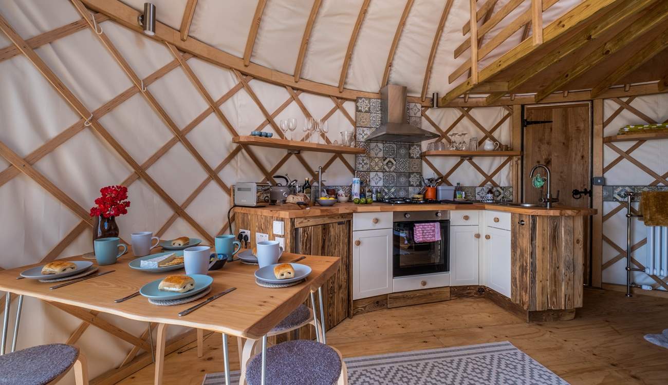 The kitchen is very well-equipped for a glamping abode. 