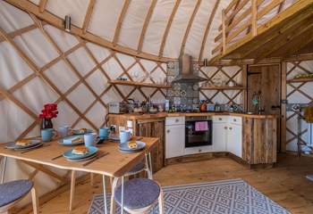 The kitchen is very well-equipped for a glamping abode. 