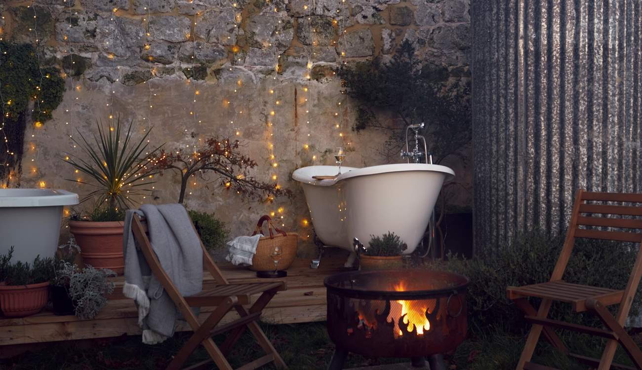 The yurt has the most luxurious, unique feature... two outdoor bathtubs. How romantic! 