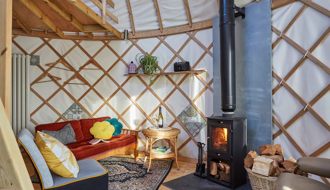 Snuggle up by the wood-burner on cooler days. 