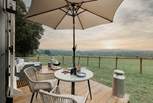 Take a seat on the deck and soak up the glorious countryside views. 