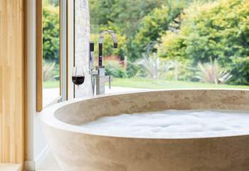 Treat yourself to a glass of red and run yourself a hot bath after a day of exploring.