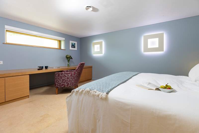 Bedroom four also houses 'zip and link' double or twin beds which are illuminated by fabulous wall-mounted lights.