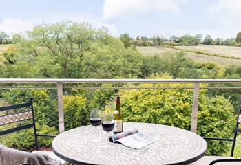 Enjoy your tranquil surroundings with a glass of wine in hand.