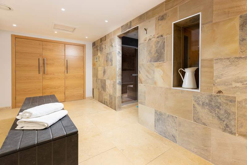 After a workout and a dip, head down the hall and relax in the beautifully finished sauna and steam-room.