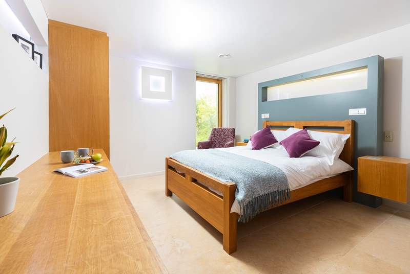 Along the hallway you'll find bedroom two, which is home to another inviting double bed.