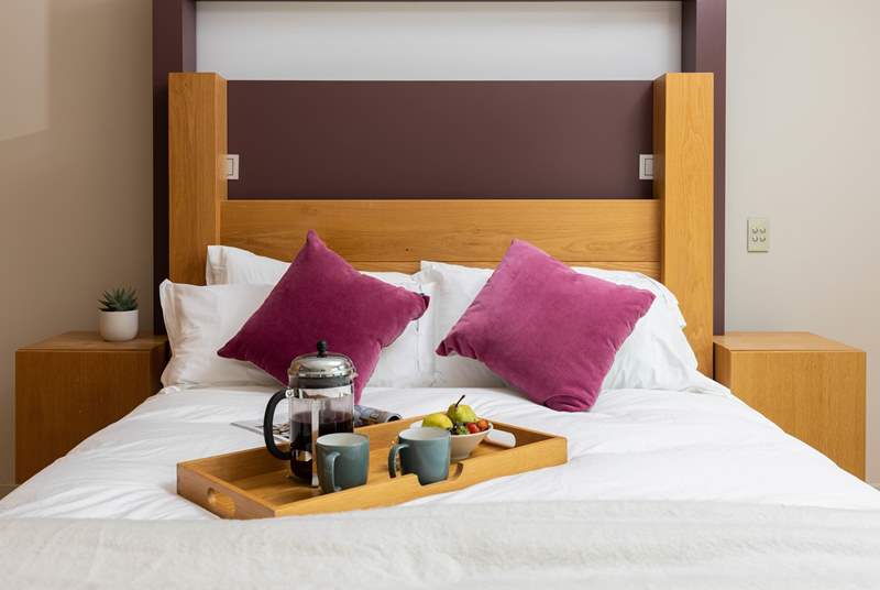 Treat yourself to a cosy breakfast in your luxurious king-size bed.