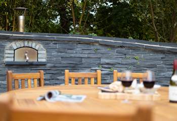 Fire up the pizza oven and enjoy dinner under the stars.