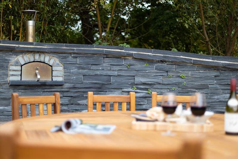 Fire up the pizza oven and enjoy dinner under the stars.
