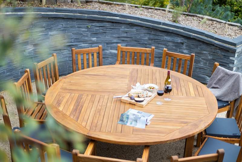 The wonderful wooden dining area provides the ideal spot for al fresco dining in the evenings.