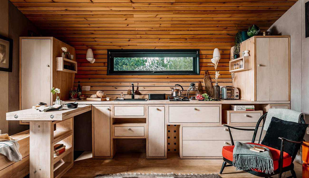 The kitchen is perfectly equipped for cooking a romantic meal for two. 