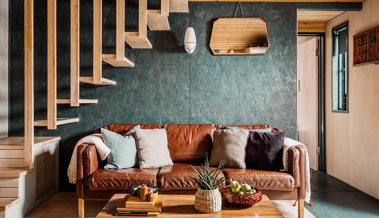 Sink into the snug sofa and simply unwind with one of the many books provided by the owners. 