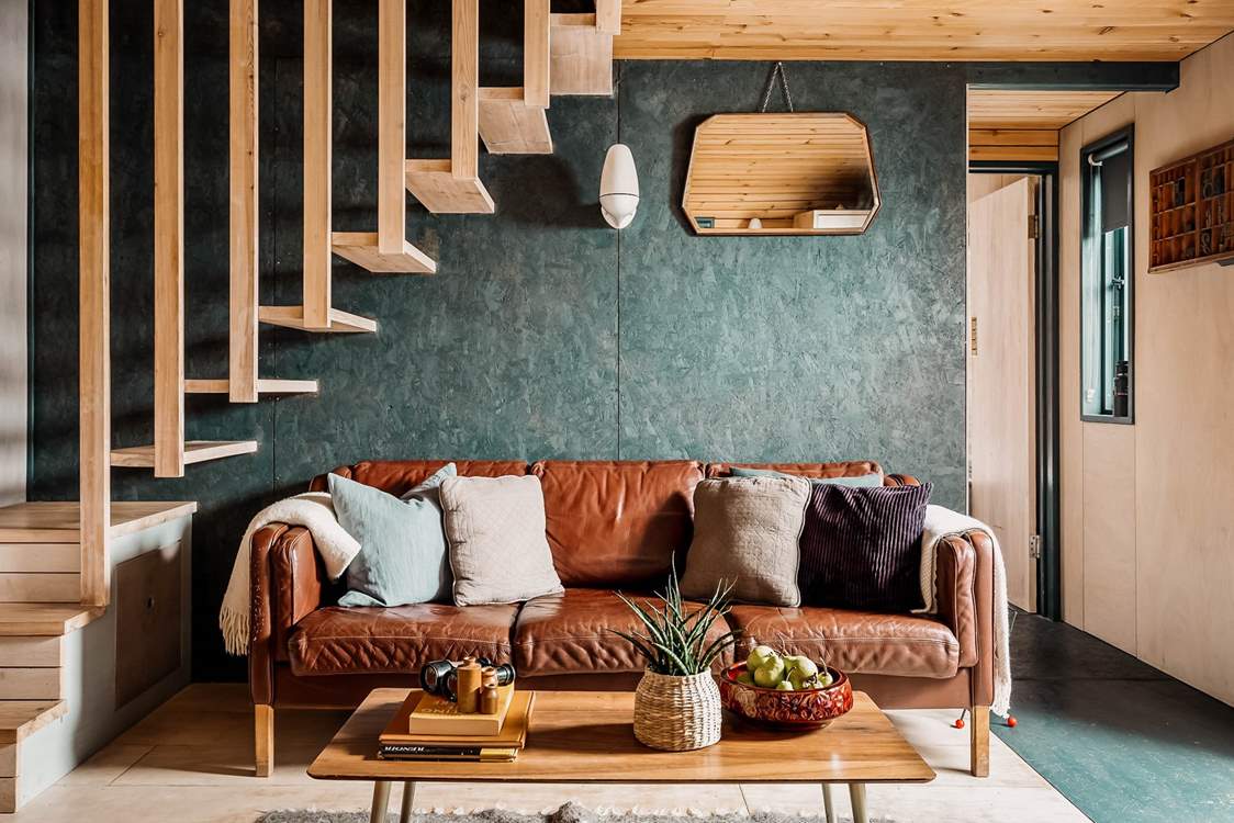 Sink into the snug sofa and simply unwind with one of the many books provided by the owners.