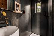 The en suite shower-room is perfectly equipped for freshening up.