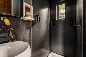 The en suite shower-room is perfectly equipped for freshening up.