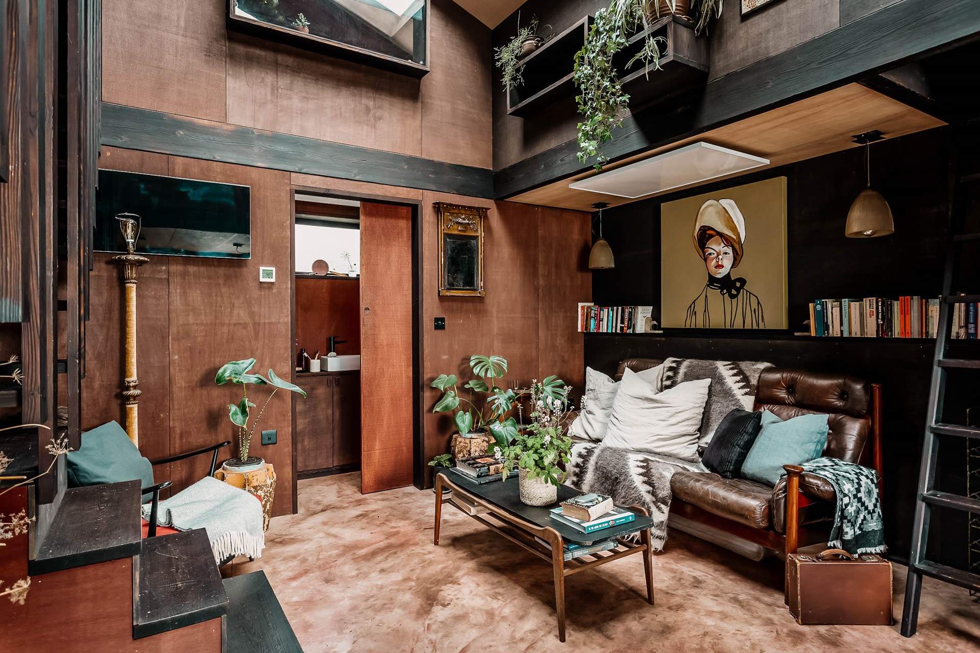 Snuggle into the cosy sofa and admire the wonderful array of books! 