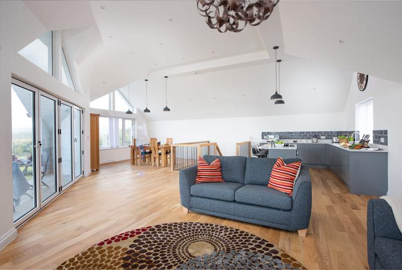 The open plan living area is beautifully created and has oodles of space.