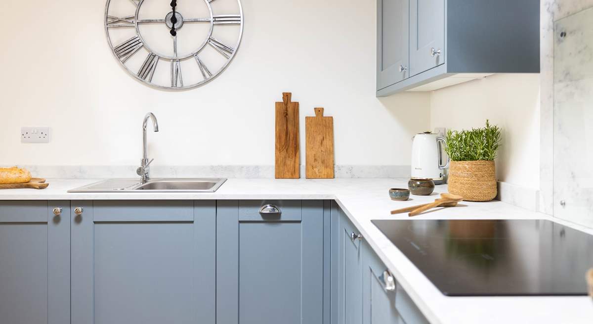 The gorgeous kitchen is ideal for preparing cosy suppers. 