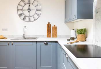 The gorgeous kitchen is ideal for preparing cosy suppers. 