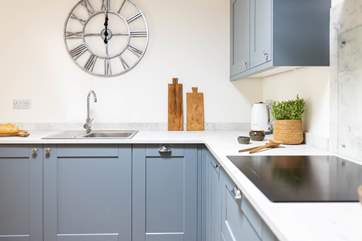 The gorgeous kitchen is ideal for preparing cosy suppers.