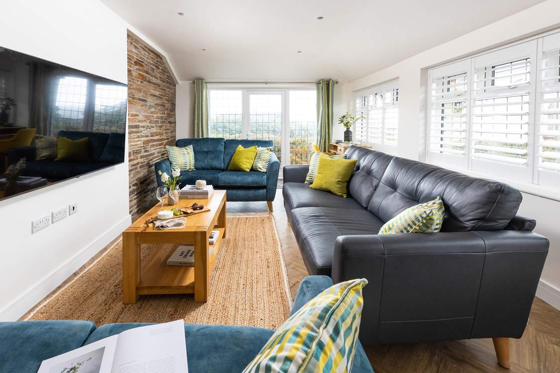 Three plush sofas offer the ideal spot to unwind in the evenings.