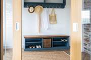 A homely entrance hall welcomes you upon your arrival.