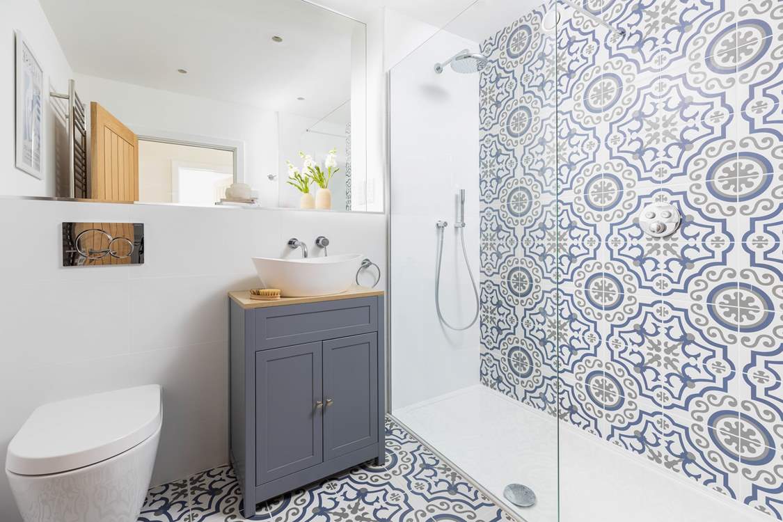A  beautifully finished shower-room makes up the ground floor.