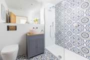A  beautifully finished shower-room makes up the ground floor.