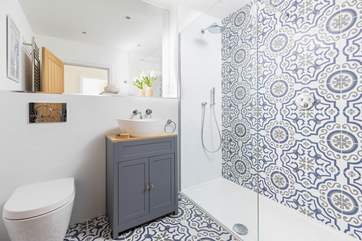 A beautifully finished shower-room makes up the ground floor.