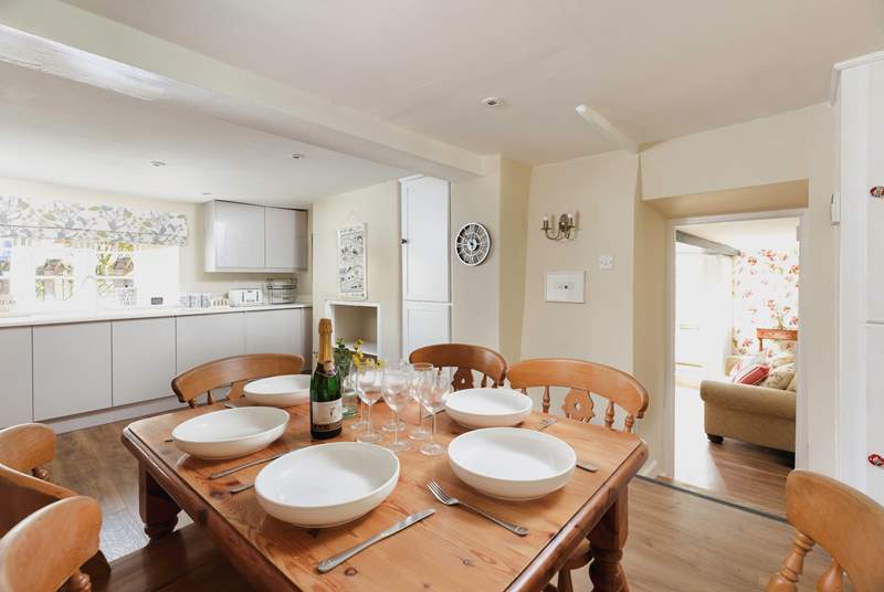 The kitchen has a lovely dining area to enjoy meals together.